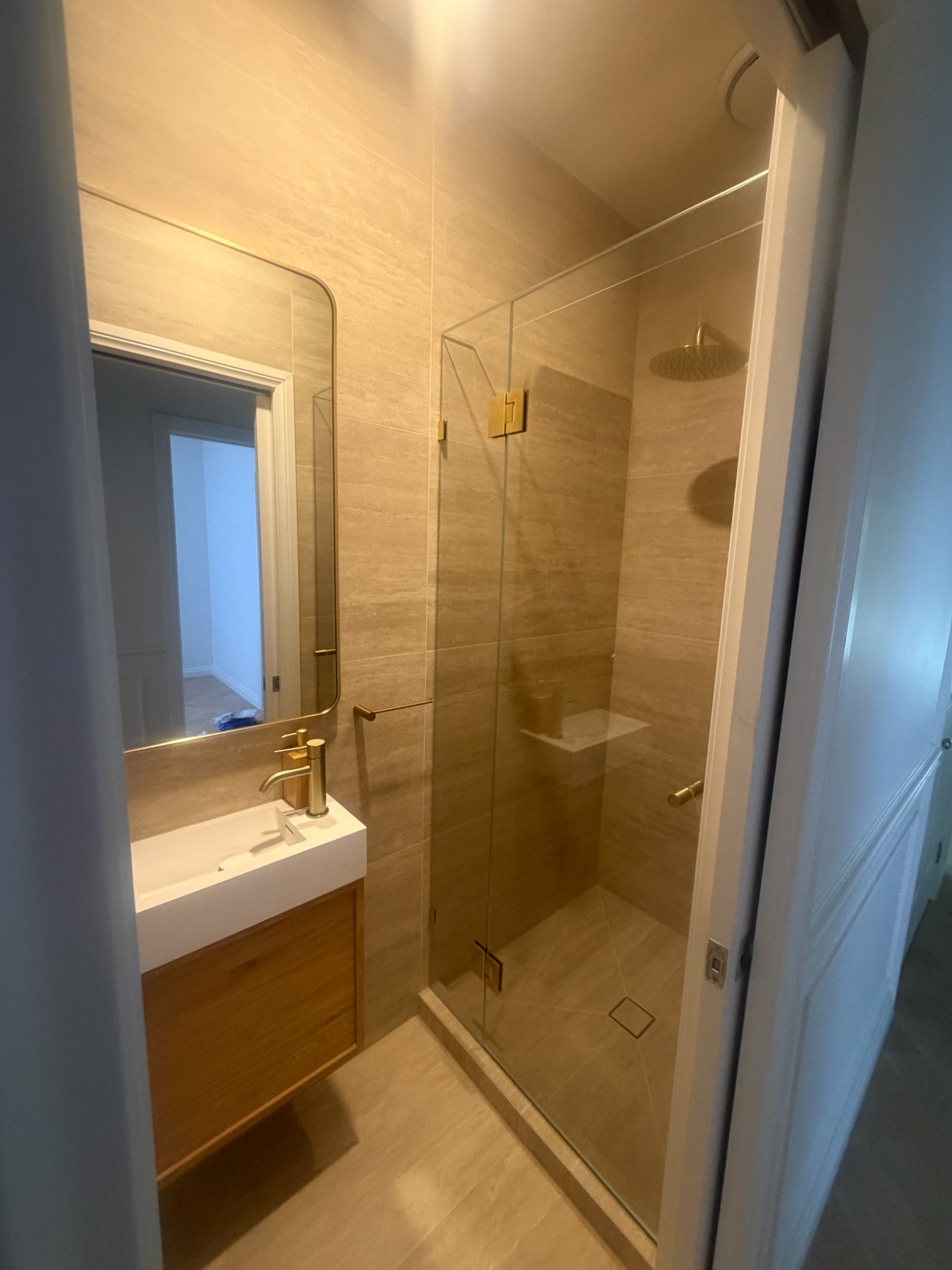 Second bathroom created through reconfiguration